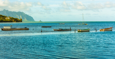 Small Fishing Boats Moored Near Heeia Kea Marina With Mokolii Island (Chinamans Hat) Across Kaneohe Bay, Oahu, Hawaii, USA