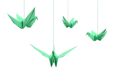 A hanging origami birds isolated white