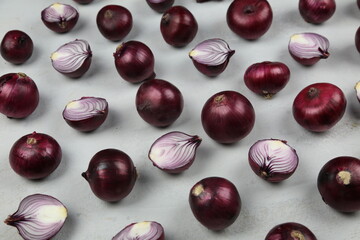 sweet red onions on background