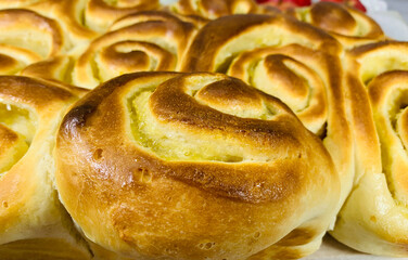 Bun with apple jam close-up. Baked bakery products. Photo of food close-up.