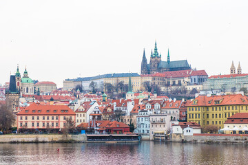 Naklejka na ściany i meble Iconic Prague historic architecture - Prague castle view over the Vltava river