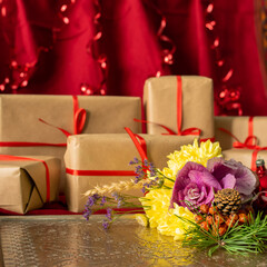 Christmas composition with bouquet and gift boxes