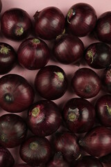 Obraz premium sweet red onions on background