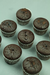 Chocolate cupcakes with colored background