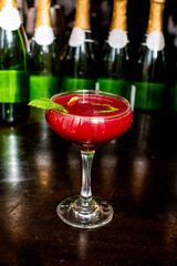 Mimosa Cocktail. Champagne cocktail made with champagne, chilled orange juice, severed in a flute and garnished with orange slices. Traditional drink served at brunch, breakfast and weddings. 