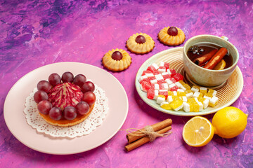 front view little cookies with cup of tea on pink background biscuit cake sweet dessert