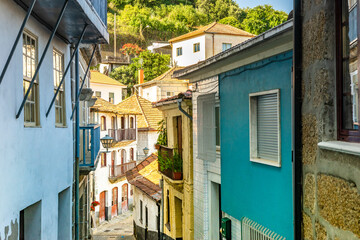 Fototapeta na wymiar Narrow street in old town of Entre-os-Rios, Douro Valley, Portugal