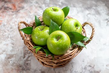 front view tasty green apples inside basket on light background fresh photo color food ripe