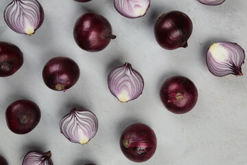sweet red onions on background