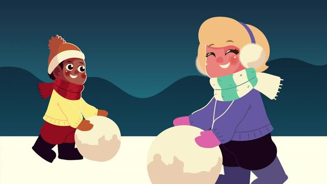 interracial kids couple wearing winter clothes playing with snowball in the snowscape night scene