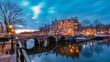 Amsterdam canals Netherlands, Amsterdam Holland during sunset evening during wintertime in the...