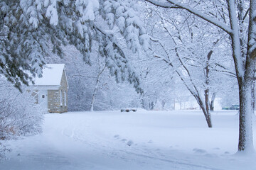 Path passes snow covered bathhouse