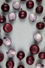 sweet red onions on background