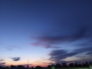 Obraz premium time clouds over the city