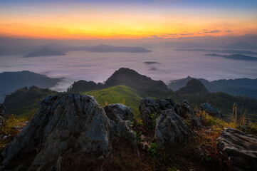 Fototapeta na wymiar Beautiful misty mountain landscape view in morning at Doi Pha mon peak viewpoint in Chiang Rai province, Thailand