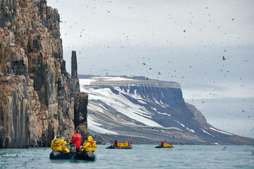 Touring Alkefjellet with zodiac in Spitsbergen, Svalbard - obrazy, fototapety, plakaty