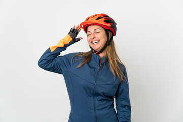 Middle age cyclist woman isolated on white background smiling a lot