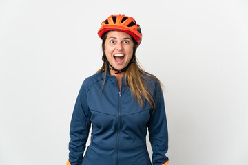 Middle age cyclist woman isolated on white background with surprise facial expression