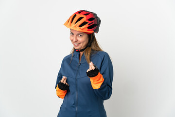 Middle age cyclist woman isolated on white background making money gesture