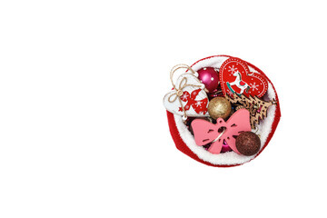 Christmas toys in a Christmas hat on a perfect white background