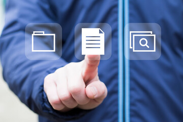Businessman pressing button file business document on virtual screen.