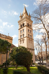 Fototapeta na wymiar Cathedral of Messina with an external transept and the attached big belfry that is also a clock tower 60 meters high. Sicily, Italy.