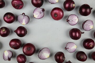 sweet red onions on background