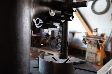 Obsolete tool in a vintage workshop setup