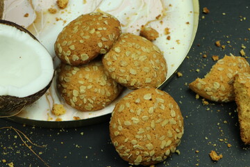  round ginger biscuit with crumbs