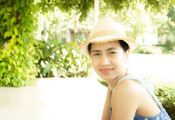 portrait of a woman smile in hat.