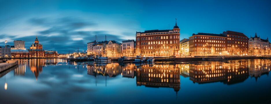 Helsinki, Finland. Panoramic View Of Kanavaranta Street With Uspenski Cathedral And Pohjoisranta Street In Evening Night Illuminations