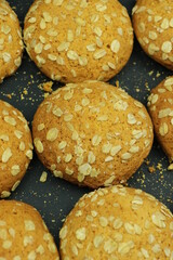  round ginger biscuit with crumbs