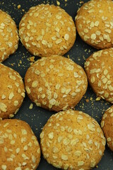  round ginger biscuit with crumbs