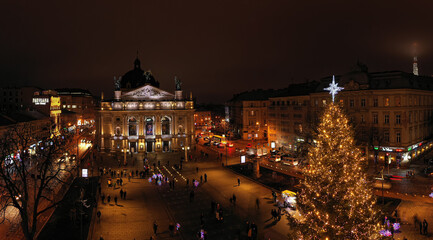 Opening of Christmas tree near Opera House in Lviv, Ukraine. View from drone