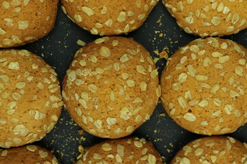  round ginger biscuit with crumbs