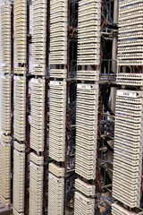 Telecommunication tag block racks in main distribution frame room