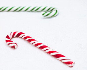 christmas canes in the snow