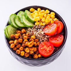 bowl of healthy quinoa with vegetables on a white background