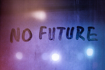words no future handwritten on night wet window surface