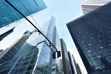 Fototapeta na wymiar Blue background with building architecture in Midtown Manhattan, New York City, USA.