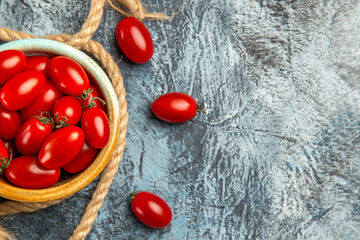 top view red cherry tomatoes with ropes on light desk ripe photo color salad free place