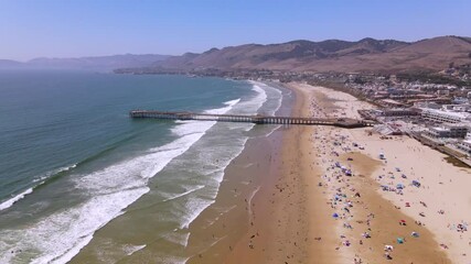2020 - An excellent aerial shot of tourists enjoying Pismo Beach, California.