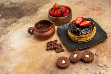 front view yummy pancakes with cookies and fruits on the wooden desk dessert cake sweet pie
