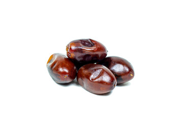 Sweet dried brown dates heap isolated on white background.