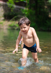 child running in the water