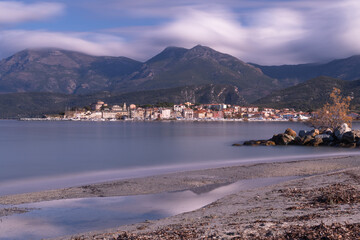Fototapeta premium Long exposure of the village of Saint Florent, seen from La Roya beach. Corsica