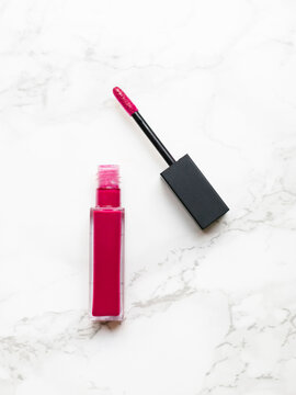 Lip gloss on marble background