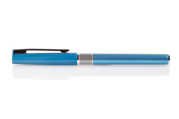 Side view of a blue ballpoint pen, isolated on a white background. Close-up.