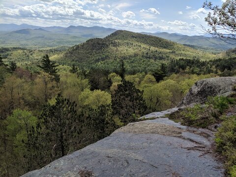 Poke-o-Moonshine trail is a hiking trail that ends with an amazing view on the Adirondacks from the edge of the cliffs