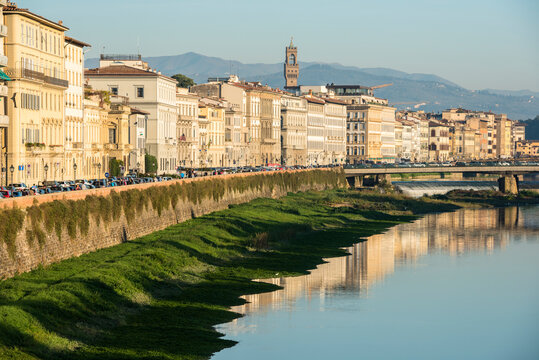 Italy, Tuscany, Florence, Cityscape reflected in Arno River